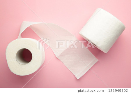 Roll of toilet paper on pink background. Roll of toilet paper on pink background. 122949502