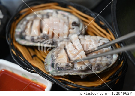 Korean seafood dish. Abalone sashimi 122949627