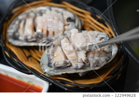 Korean seafood dish. Abalone sashimi 122949628