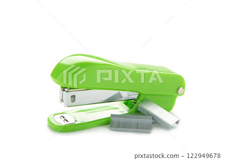 Green stapler isolated on a white background Green stapler isolated on a white background 122949678