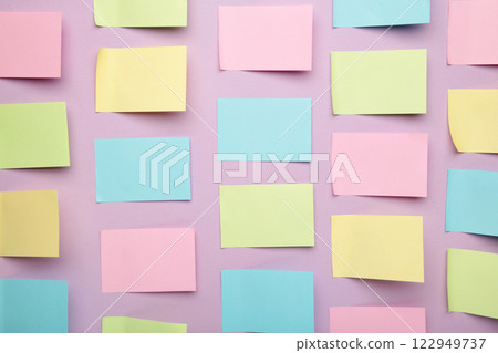 Colorful sticky notes on purple background. 122949737