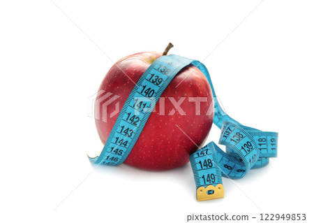 Diet Concept with apple and measuring tape, isolated on white background 122949853