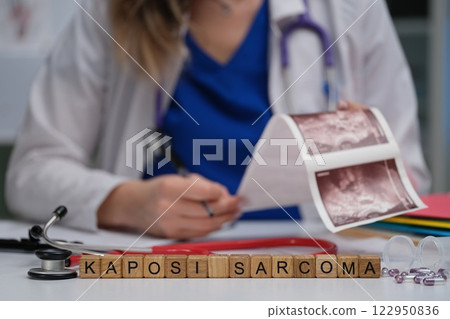 A Medical Professional Engaging in the Analysis of Kaposi Sarcoma Medical Images for Diagnosis A Medical Professional Engaging in the Analysis of Kaposi Sarcoma Medical Images for Diagnosis 122950836