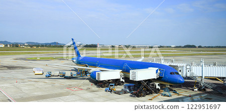 Process of Pre-flight service and handling. Luggage and catering loading at International Airport. 122951697