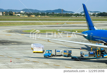 Process of Pre-flight service and handling. Luggage and catering loading at International Airport. 122951698