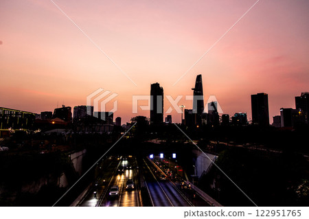 Bitexco and Landmark 81 at Sunset in Ho Chi Minh City with Saigon Bridge and Scenic View 122951765