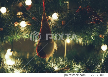 Christmas Tree with Book and Nativity Scene Festive Holiday Decorations and Cozy Seasonal Atmosphere. High quality photo 122951800