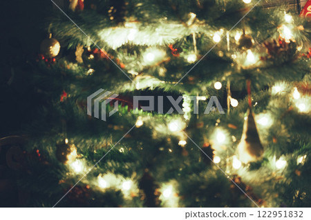 Christmas Tree with Book and Nativity Scene Festive Holiday Decorations and Cozy Seasonal Atmosphere. High quality photo Christmas Tree with Book and Nativity Scene Festive Holiday Decorations and Cozy Seasonal Atmosphere. High quality photo 122951832