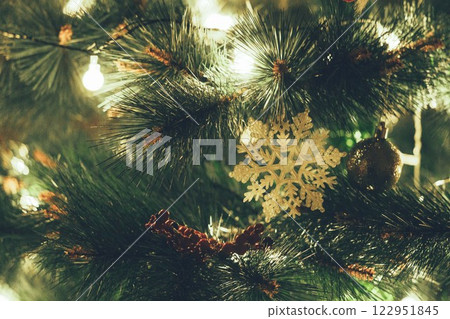 Christmas Tree with Book and Nativity Scene Festive Holiday Decorations and Cozy Seasonal Atmosphere. High quality photo 122951845