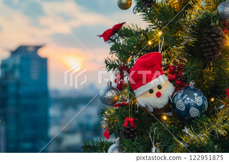 Nativity Scene with Christmas Tree and Balloon Decorations in Office Festive Atmosphere with Santa Claus. High quality photo 122951875