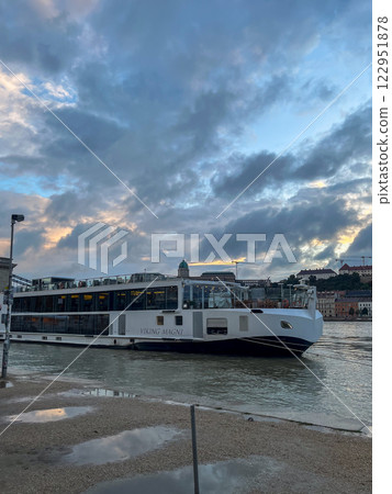 Sightseeing boat on the Danube in the historical center of Budapest. High quality photo Sightseeing boat on the Danube in the historical center of Budapest. High quality photo 122951878