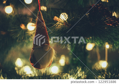Christmas Tree with Book and Nativity Scene Festive Holiday Decorations and Cozy Seasonal Atmosphere. High quality photo 122951886