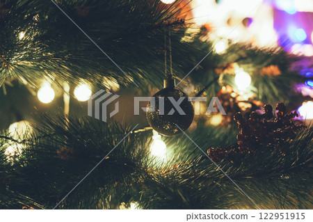 Christmas Tree with Book and Nativity Scene Festive Holiday Decorations and Cozy Seasonal Atmosphere. High quality photo 122951915