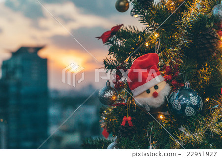 Nativity Scene with Christmas Tree and Balloon Decorations in Office Festive Atmosphere with Santa Claus. High quality photo 122951927