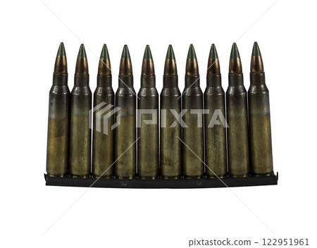 Assault rifle cartridges caliber 5.56 in a clip on a transparent background. High quality photo 122951961