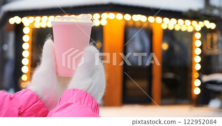 Crisp pink container embodies minimalism throughout winter setting, capturing minimalism as design statement, while minimalism resonates with viewers seeking refined seasonal style effortlessly. 122952084