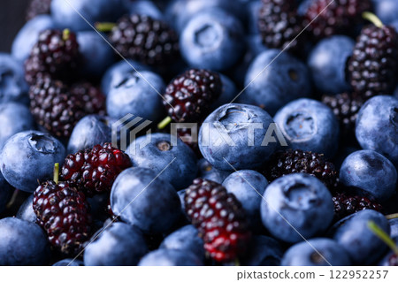 Fresh blueberries and mulberries close up 122952257