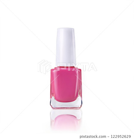 Bright pink nail polish bottle on a plain background for beauty and fashion enthusiasts 122952629