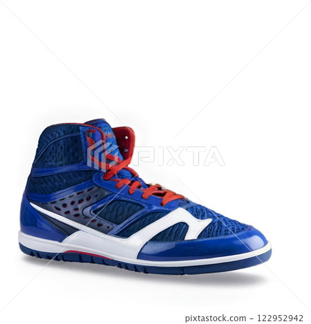 A modern sports shoe designed for optimal performance during soccer matches and training sessions 122952942