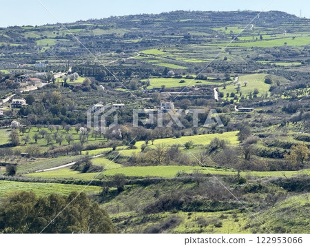 Scenic view of lush green landscape. Spring time, beautiful view of the mountainous area. Scenic view of lush green landscape. Spring time, beautiful view of the mountainous area. 122953066