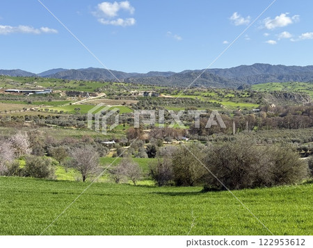 Scenic view of lush green landscape. Spring time, beautiful view of the mountainous area. 122953612