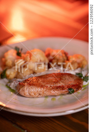 Baked turkey and cauliflower are a delicious dish 122956092