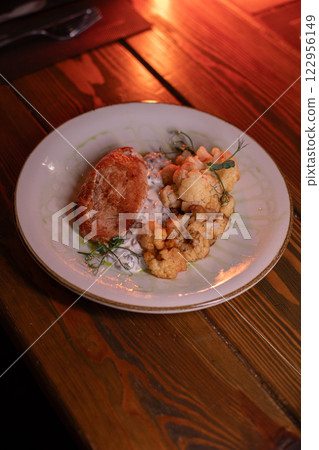Baked turkey and cauliflower are a delicious dish 122956149