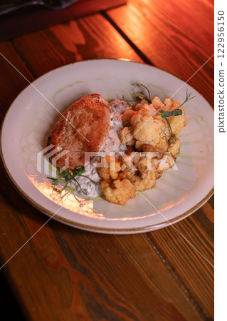 Baked turkey and cauliflower are a delicious dish 122956150