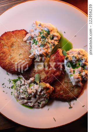 golden, crispy draniki, freshly cooked in the 122956239