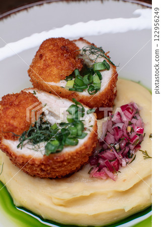 Delicious cutlets with airy mashed potatoes served 122956249