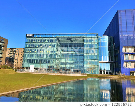 DR - danmarks radio DR logotype on a panel. Danmarks Radio, abbreviated DR is the danish public broadcasting company founded in 1925, Copenhagen, Denmark 122956752