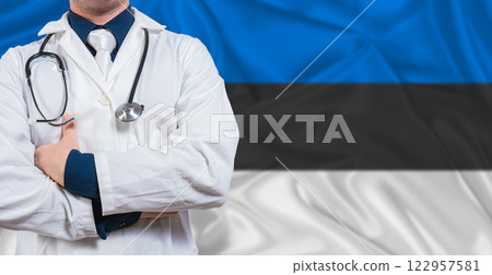 Male Doctor With Stethoscope On Estonia Flag. Doctor Holding Stethoscope On Estonia Flag 122957581