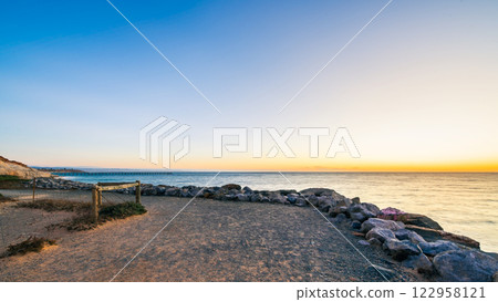 Christies Beach coastline with Witton Bluff trail at dusk 122958121