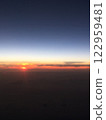 A sunset glow seen from an airplane 122959481