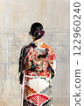 A woman in a kimono 122960240