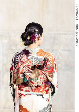 A woman in a kimono 122960242