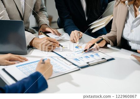 Business People Planning Strategy Analysis Office Concept. writing notes about sticky notes Laptop,tablet Planning Business People Planning Strategy Analysis Office Concept. writing notes about sticky notes Laptop,tablet Planning 122960867