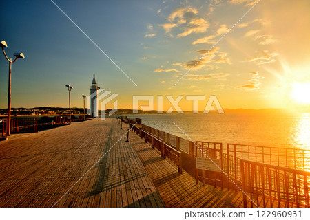 Enoshima Shonan Great Embankment Shonan Port Lighthouse dyed orange 122960931