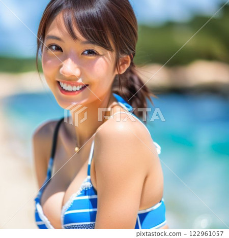 A woman sitting by the pool A woman sitting by the pool 122961057