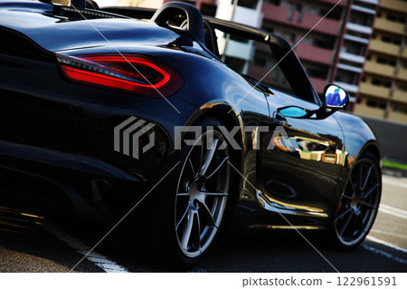 shiny black open car 122961591