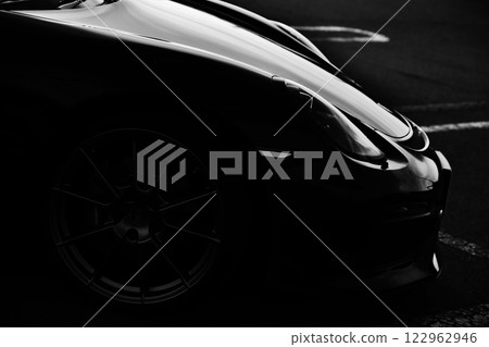 A shiny black sports car 122962946