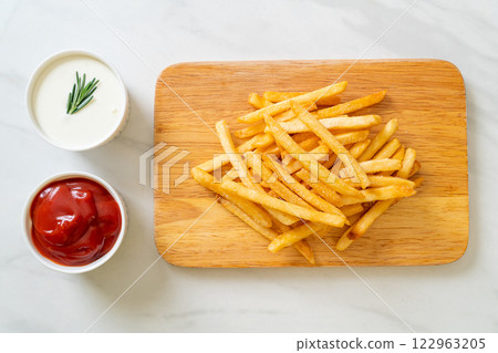French fries with sour cream and ketchup French fries with sour cream and ketchup 122963205