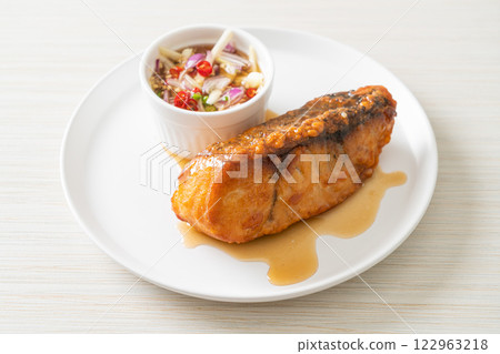 fried snapper fish with fish sauce and spicy salad fried snapper fish with fish sauce and spicy salad 122963218