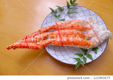 King crab served on a platter King crab served on a platter 122963675