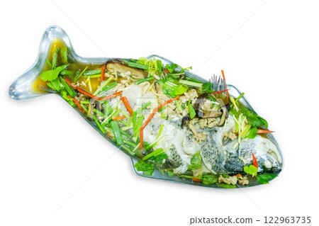 Top view of Steamed Seabass with Lime and Chillies, focus selective Top view of Steamed Seabass with Lime and Chillies, focus selective 122963735