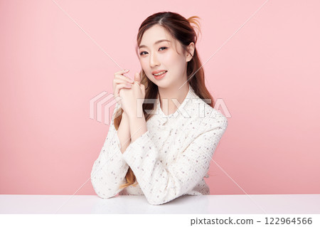 Beautiful young asian woman with clean fresh skin on pink background, Face care, Facial treatment, Cosmetology, beauty and spa, Asian women portrait. 122964566