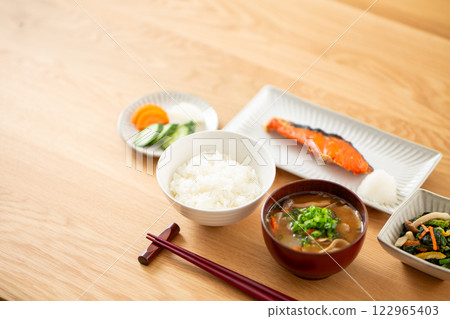 A Japanese breakfast featuring grilled salmon 122965403