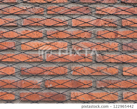 Red brick wall with black net design pattern Red brick wall with black net design pattern 122965442