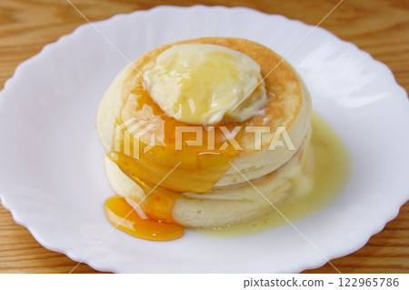 Pancakes with honey Pancakes with honey 122965786