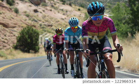 Road bike cyclist racing in a bicycle race 122966314